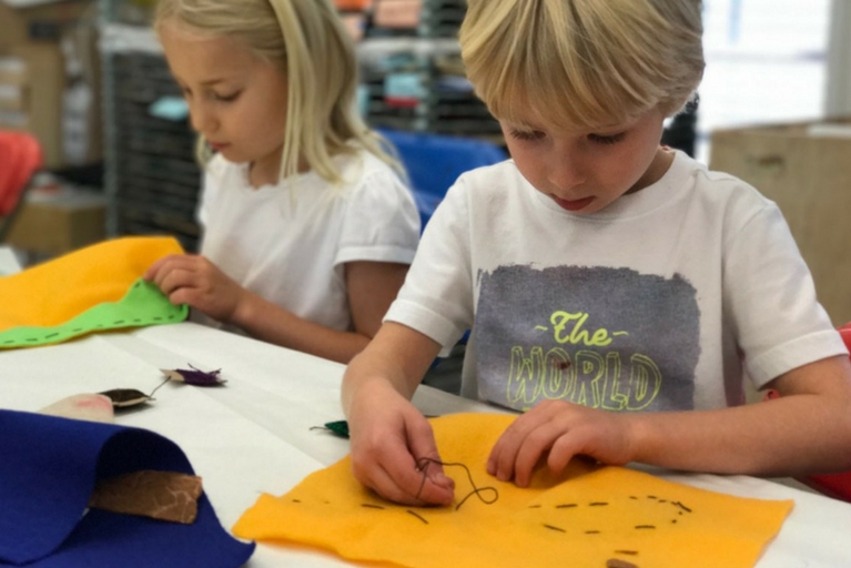 Boy and Girl sewing fiber arts